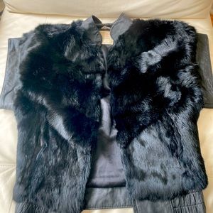 Fur Vest. Fur and leather. Fully zips and in great condition. Classic.